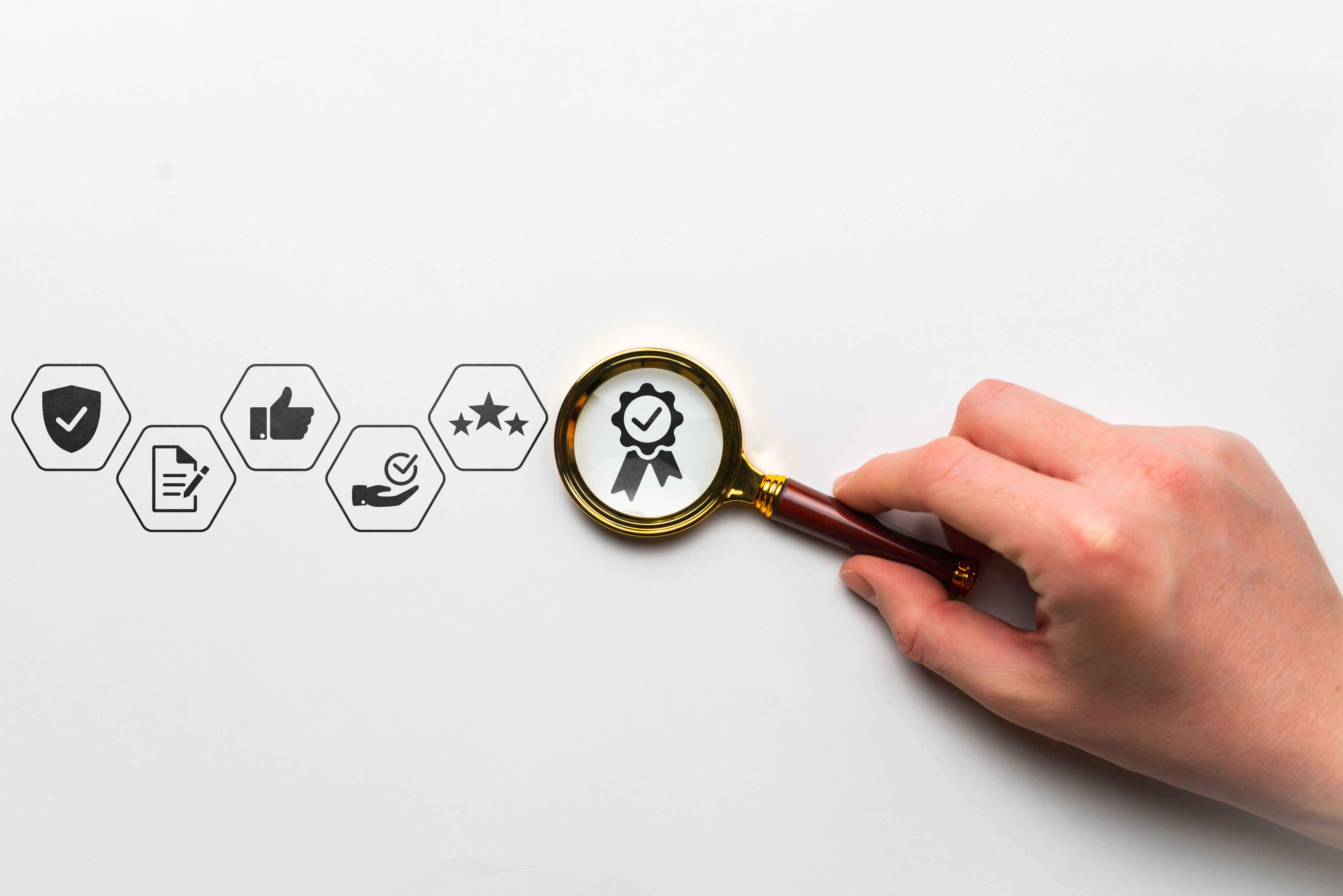 quality-research-concept-with-thematic-icons-hand-holds-magnifying-glass%20%281%29.jpg