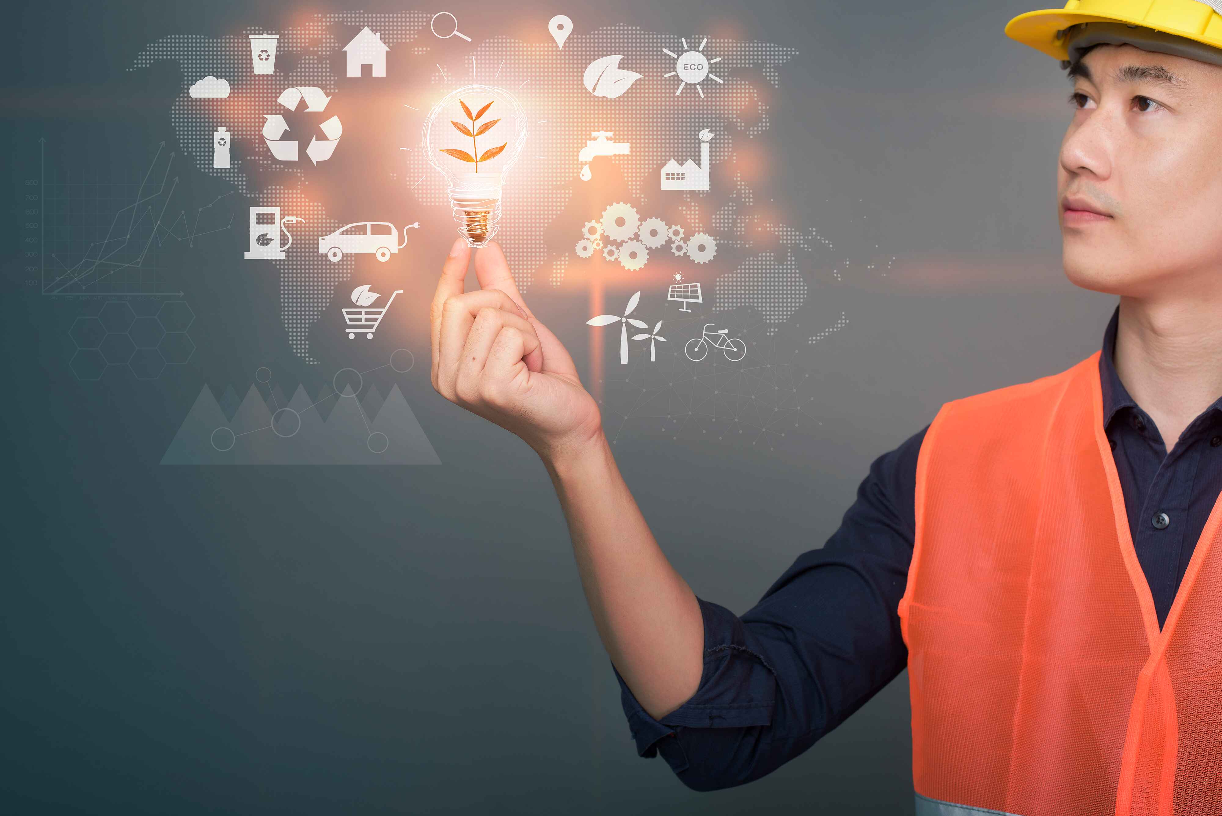 vecteezy_engineer-man-is-holding-digital-engineering-plan-with_5130279%20%281%29.jpg